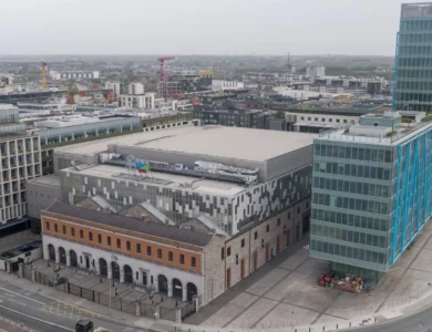Aerial view of modern buildings in a bustling Dublin district near the 3Arena.