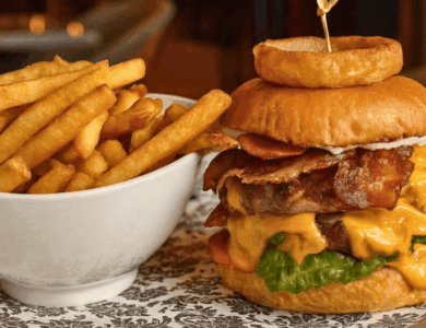 Delicious burger with crispy fries at the Arlington Hotel's bar in Dublin.