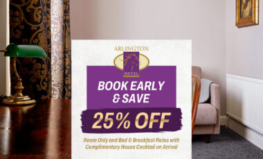 Hotel room with elegant decor and promotional offer for 25% off stays.