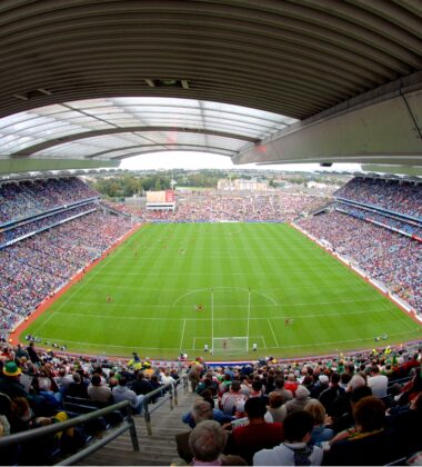 A crowded stadium during a sporting event, with spectators filling the stands.