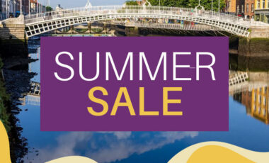 Ha'penny Bridge over calm river with 'Summer Sale' text overlay in Dublin.