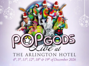 Colourful band in festive attire perform at Arlington Hotel with "POP GODS Live" text.